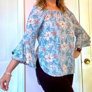 Cupio floral blouse in medium with flutter sleeves.
